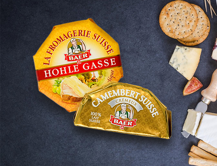 Packaged cheese on a slate board